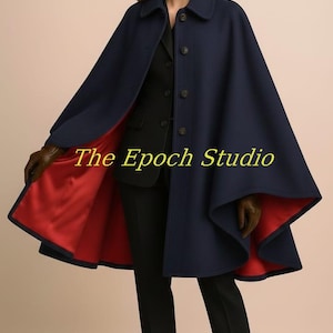 May include: A navy blue cape with a red lining, worn with a matching hat and gloves. The cape has a button-up front and is paired with black pants and brown boots. The text "The Epoch Studio" is visible.