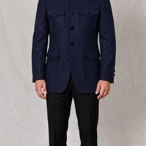 May include: A navy blue jacket with four front pockets and black buttons. The jacket is paired with black dress pants. The outfit is a classic, tailored look.