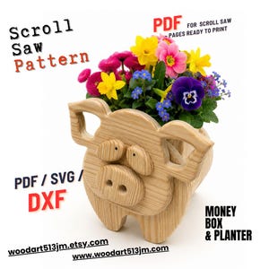May include: A wooden pig-shaped planter filled with colorful flowers. The planter has a money box feature and is made from a scroll saw pattern. Text on the image includes "Scroll Saw Pattern", "PDF for Scroll Saw", and website addresses.