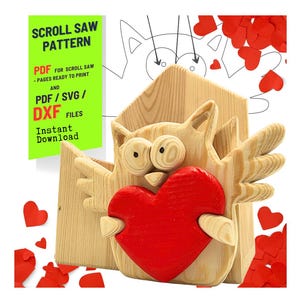 May include: A wooden owl-shaped scroll saw pattern, holding a red heart. The owl is made of light-colored wood with visible grain. The image includes the text "SCROLL SAW PATTERN" and "PDF/SVG/DXF FILES". Red paper hearts are scattered around.