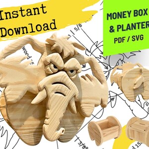 Op de afbeelding: Een houten olifantvormig spaarpot- en plantenbakontwerp. De afbeelding toont een groot, gebeeldhouwd olifantengezicht met gedetailleerde kenmerken, naast kleinere geassembleerde voorbeelden. De tekst luidt "Direct downloaden" en "Spaarpot & Plantenbak PDF/SVG".