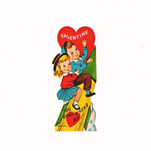 Vintage Valentine&#39;s Day Card: Boy and Girl on Rocket