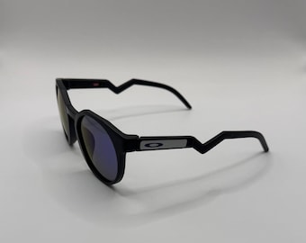 O HSTN Sunglasses – Matte Black Frame / Blue  Lenses •  Oakley Round Streetwear Shades • Zigzag Temple Design