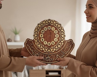 May include: A wooden clock with Arabic calligraphy and a decorative circular design. The clock face features numbers 1 through 12. The clock is brown with gold accents and is being held by two people.