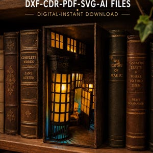 May include: A wooden book nook insert featuring a miniature shop interior with warm interior lighting, grid-patterned windows, and a dark frame. The text DXF-CDR-PDF-SVG-AI FILES and DIGITAL-INSTANT DOWNLOAD is displayed above the structure.