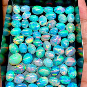Lote de cabujones ovalados de ópalo blanco AAA+, piedra preciosa suelta de ópalo etíope Welo multifuego natural imagen 8