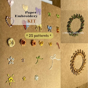 May include: A paper embroidery kit featuring 25 patterns on brown cardstock. The designs include small stitched hearts, bows, flowers, stars, and two circular wreaths in green and gold thread. The text reads Paper Embroidery KIT * 25 patternts *.