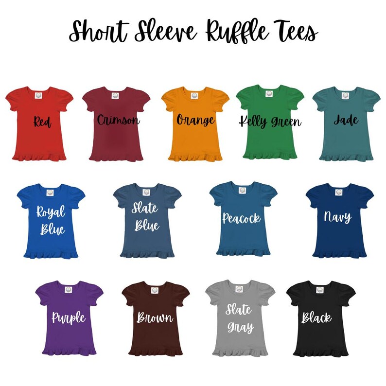May include: A collection of 14 short-sleeved ruffle tees in various colours, including red, crimson, orange, kelly green, jade, royal blue, slate blue, peacock, navy, purple, brown, slate grey, and black. The tees have a ruffled hem and are perfect for girls.