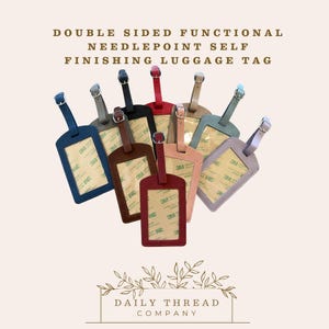 May include: A collection of double-sided functional needlepoint self-finishing luggage tags in various colors including blue, grey, black, red, tan, pink, and lavender. Each tag features a clear window with 3M adhesive backing and a buckle strap.