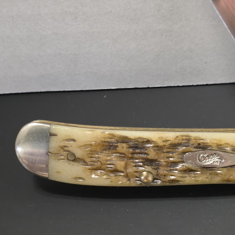 Case XX Mini Trapper Pocket Knife – 2006 – Peach Seed Jigged Bone image 13