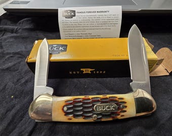 Navaja de bolsillo Buck 389 Canoe con mango de hueso marrón texturizado, nueva en caja, con sistema de bloqueo deslizante 0389