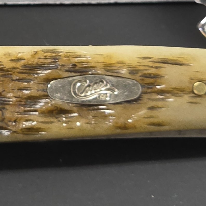 Case XX Mini Trapper Pocket Knife – 2006 – Peach Seed Jigged Bone image 3