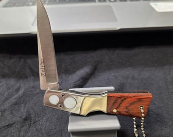 Navaja de bolsillo JKR INOX Toledo Lockback con mango de madera y forma de rifle (España)