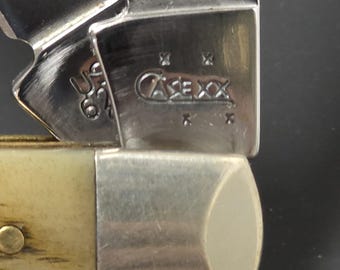 Case XX Mini Trapper Pocket Knife – 2006 – Peach Seed Jigged Bone