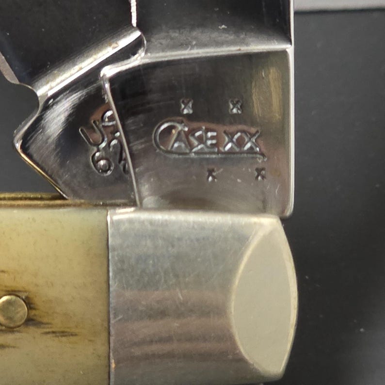 Case XX Mini Trapper Pocket Knife – 2006 – Peach Seed Jigged Bone image 1