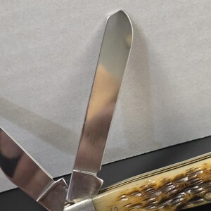 Case XX Mini Trapper Pocket Knife – 2006 – Peach Seed Jigged Bone image 7
