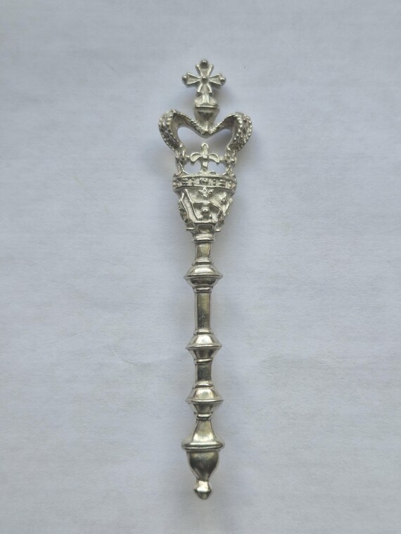 Vintage silver-tone scepter brooch