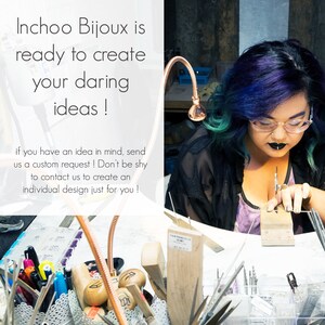 May include: A woman with purple and blue hair is working on a piece of jewelry. She is using a small tool to shape the metal. The text on the image reads "Inchoo Bijoux is ready to create your daring ideas! If you have an idea in mind, send us a custom request! Don't be shy to contact us to create an individual design just for you!"