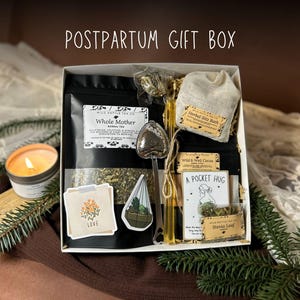 May include: A set of three ceramic mugs with a speckled, matte finish in cream, light grey, and dark grey. Each mug has a simple, minimalist design and a rounded handle.