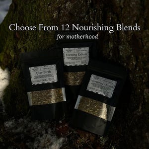 May include: Three black pouches of herbal tea blends, labeled "After Birth", "Evening Exhale", and "Nurtured Mama". The text "Choose From 12 Nourishing Blends for motherhood" is above the pouches. The background is a tree trunk and snow.
