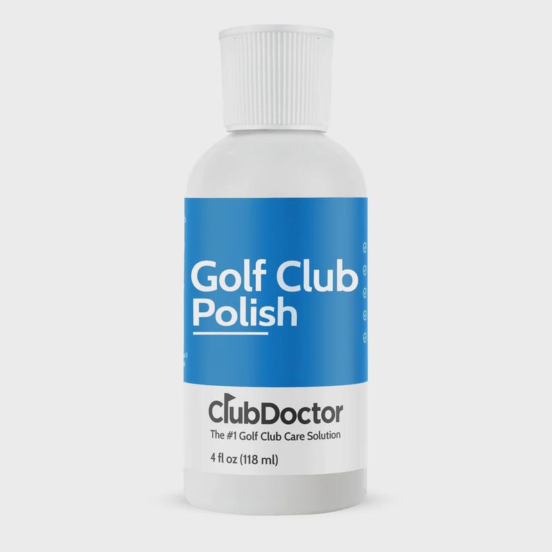 以下が含まれることがあります： 青いラベルが付いたClubDoctor Golf Club Polishの白いプラスチックボトル。ラベルには、Golf Club Polish、ClubDoctor、The #1 Golf Club Care Solution、4 fl oz (118 ml) という文字が白と黒で記載されています。