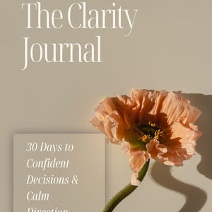 May include: The Clarity Journal cover with a peach-colored flower and the text "30 Days to Confident Decisions & Calm Direction." The journal is a self-help tool for personal growth and decision-making.
