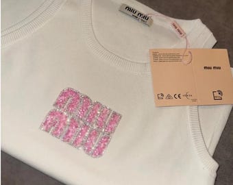 Camiseta sin mangas blanca y rosa para mujer con espalda deportiva y top corto estilo Miumiu Coachella Y2K, tallas S, M y L.