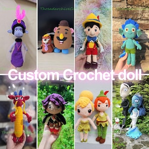 May include: A collection of eight handmade crochet dolls featuring various characters including a purple figure with a feather, a brown potato-shaped toy, a boy in a yellow hat, a blue sea creature, a red dragon, a dark-haired figure, a fairy, and a couple.
