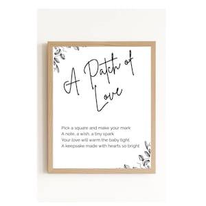 Könnte beinhalten: Ein gerahmter Druck mit den Worten "A Patch of Love" in eleganter Schrift. Der Druck enthält ein Gedicht über das Setzen eines Zeichens und die Erstellung eines Andenkens. Der Rahmen ist hellbraun mit floralen Akzenten.