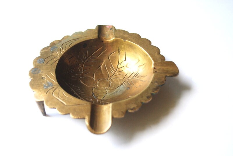 Art nouveau 1905 brass, asymmetric , footed, scalloped , round  ,   exotic flower , etched , China ashtray , 3 cigarette.