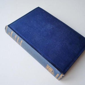 May include: A blue hardcover book with gold lettering on the spine. The title is "The History of Russia" by A.S. Rappoport.