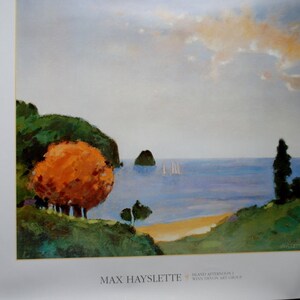 May include: A painting of a seascape with a small island in the distance. The foreground features a lush green hillside with a single orange tree and a small beach. The sky is a soft blue with white clouds. The painting is titled "Island Afternoon" by Max Hayslette.