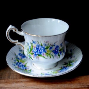 1960  vintage Victorian  style porcelain tea set : cup and saucer  with &quot; forgot my not &quot; pattern. By Paragon, England.