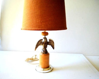 Americana vintage 60s , brass  american eagle , table lamp with a burlap shade.