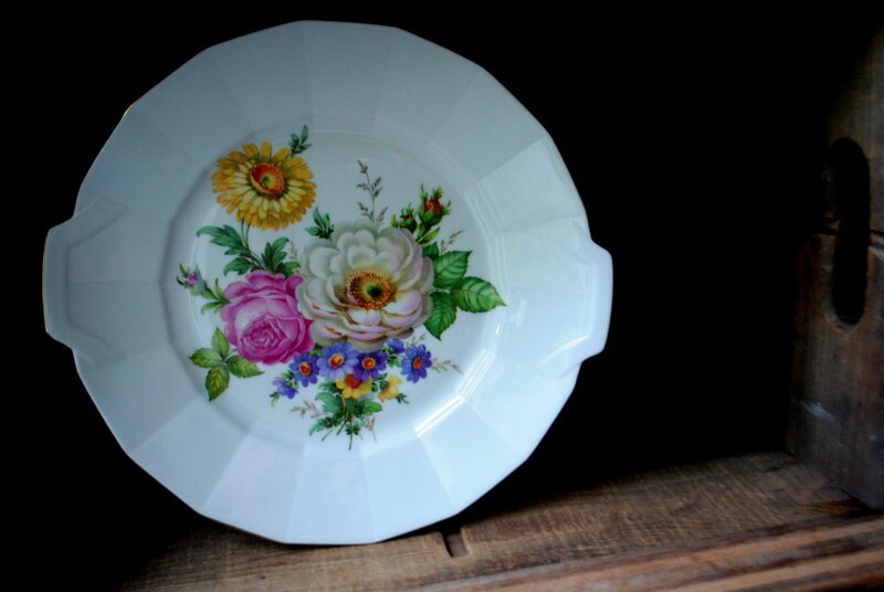 Beautiful  vintage 1969, German porcelain ,  sculptured  , ribbed  plate with a botanical , hand print  at the middle. By Furstenberg.