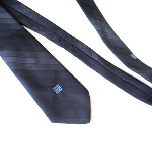 Luxurious vintage 80s dark navy blue polyester necktie with a light blue logo. Made by Givenchy. image 3