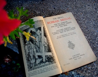 1936 vintage , religious catholic pocket book , English- Latin " The Small  Roman Missal"  by Regina  Press, New York.