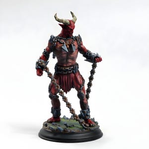 May include: A detailed figurine of a red demon with horns, holding chains. The figure has a muscular build, with intricate armor and chain details. It stands on a rocky base with a black circular platform. The demon's skin is a deep red.