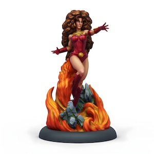 May include: A figurine of a female superhero in a red bodysuit, boots, and gloves, with a gold emblem on her chest. She has long, flowing brown hair and is posed with outstretched arms, standing on a base of flames and rocks. The base is dark gray.