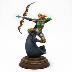 May include: A detailed figurine of an archer in a dynamic pose, drawing a bow. The archer wears silver and brown armor with green and gold accents. The base is brown with a decorative pattern, and the archer is posed on a dark blue, flowing element.