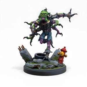 May include: A detailed figurine of a multi-limbed monster with a green head, multiple eyes, and a gaping mouth. The figure is posed dynamically, with a base featuring debris, a tyre, and a red fire hydrant. The colour palette includes green, purple, blue, and grey.