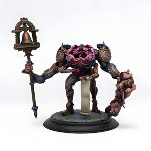 May include: A detailed figurine of a monstrous humanoid figure with a large, exposed brain and intricate armour. The figure holds a staff with a bell and a scroll. The colour palette includes blues, browns, and purples, with a detailed base.