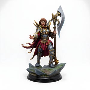 May include: A detailed figurine of a warrior in silver armor with gold accents, a red cape, and a large axe. The figure stands on a rocky base with a black circular stand. The warrior has brown hair and is in a battle-ready pose.