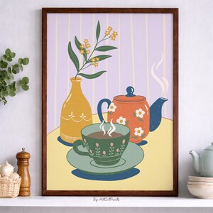 May include: A framed art print depicting a still life with a yellow vase holding greenery, an orange teapot with white flower details, and a green teacup and saucer. The background is a light purple with vertical stripes. The text "By ArtCutPrints" is at the bottom.