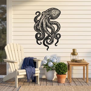 May include: Black metal octopus wall art. The octopus has detailed tentacles and a textured head. The artwork is mounted on a white wall, suggesting outdoor or nautical decor. The octopus is a decorative element.