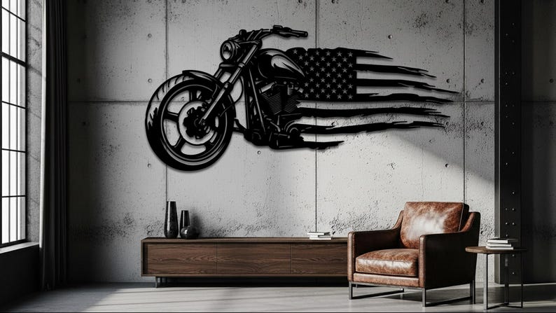 May include: Black metal motorcycle wall art with an American flag design. The motorcycle is depicted in profile, with the flag appearing to be blowing in the wind. The artwork is mounted on a concrete wall.
