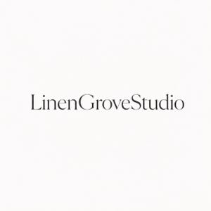 May include: The text LinenGroveStudio is displayed in a dark grey, serif font centred against a plain white background. The lettering is clean and legible, featuring a classic typeface style that presents the brand name clearly and simply.