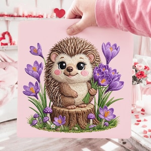 May include: A pink square featuring a cartoon hedgehog holding purple flowers. The hedgehog has brown quills, a light brown body, and pink cheeks. Purple crocuses and mushrooms surround the hedgehog, which is sitting on a tree stump.