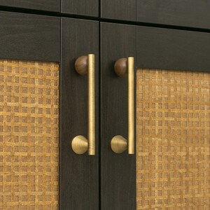 May include: A set of three ceramic mugs with a speckled, matte finish. The mugs are in shades of cream, light gray, and dark gray. Each mug has a simple, minimalist design, perfect for coffee or tea.