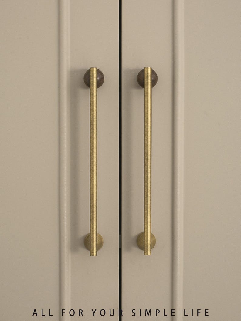 May include: A set of three ceramic mugs with a speckled, matte finish. Each mug features a different color: light blue, cream, and gray. The mugs have a simple, modern design with a rounded shape and a comfortable handle.